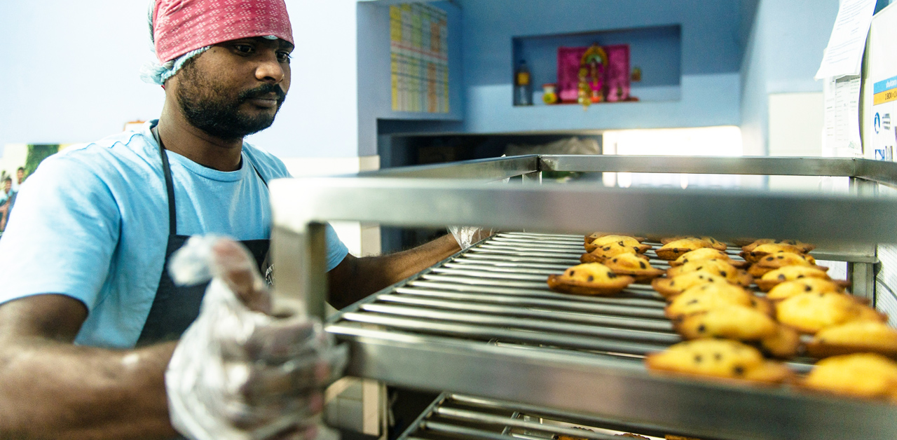 Shuktara Cakes - Sanjay, checking the madeleines